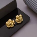 Floral Gold Tone Stud Earrings
